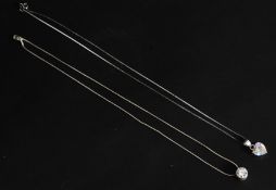 2 silver ladies necklaces, one with cylindrical cz finial to centre,