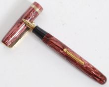 A Vintage Watermans 512v fountain pen In A Purple lustre Straight Pearl Pattern - lever fill with