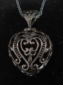 A silver tigers eye pendant necklace on silver necklace chain. Total weight 19.1g.