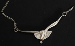 A silver ladies vintage 925 Art Nouveau seagull pendant and necklace chain. Total weight 5.