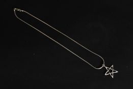 A fine Omega linked silver necklace with star pendant. Stamped for KH 925. Total weight 10g.