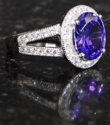 A silver cz and amethyst dress ring. Total weight 5.