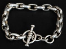 A contemporary chunky linked silver bracelet.