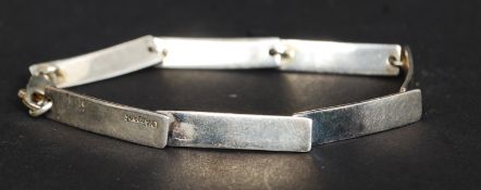 A contemporary ingot bar linked silver bracelet marked D'Argent Total weight 14.