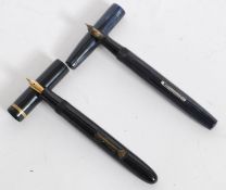 A vintage Watermans Ideal 14ct nib lever fill fountain pen in a blue/grey lustre body.