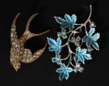 A ladies pave set diamonte gilded metal brooch in the form of a swallow together with a enamel set