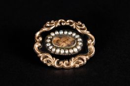 Early Victorian Pinch beck Mourning Brooch, Set with Pearls. Classical Shaped Border. c.1840's. 1.25