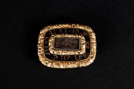 A Small Early Victorian Gold Mourning Brooch with Ornate Embossed Border. Date 1839. 1.25 Inches