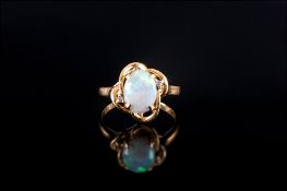 18ct Gold Set Single Stone Opal Ring. Marked 18ct. 3 Grams.