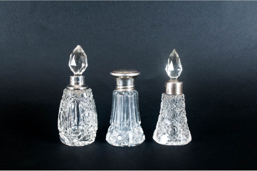 3 Silver Topped Perfume Bottles