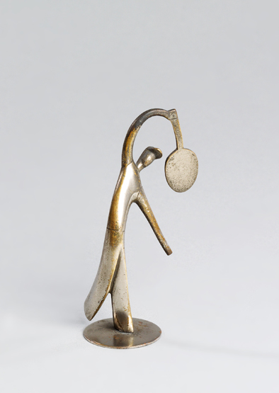 Hagenauer Figurine, a silver-patinated figure of a male lawn tennis player making an overhead