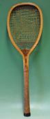 Rare Eureka wooden tennis racket with an excellent frame and a small^ round cork-handled grip. Red