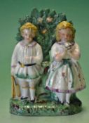 Original Vic Staffordshire ceramic cricket group of figures - comprising a boy holding a cricket bat