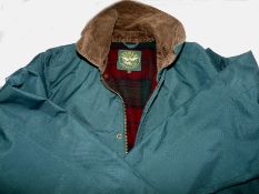 JACKET: An Aigle waterproof sporting jacket, size medium, brown cord collar, measures 52
