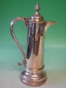 A Silver Plated Coffee Pot Of plain tapering form with foliate finial. Maker: Walker and Hall. 15