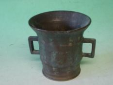 An Oriental Bronze Mortar Of archaic two handled form. 4