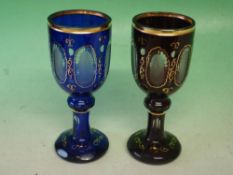Bohemian Glass Two overlaid goblets, cut, etched and enriched with gilding. 8
