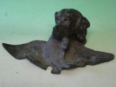 A Bronze Inkstand Realistically modelled as a retriever with duck. Early 20th century. 11 ¼