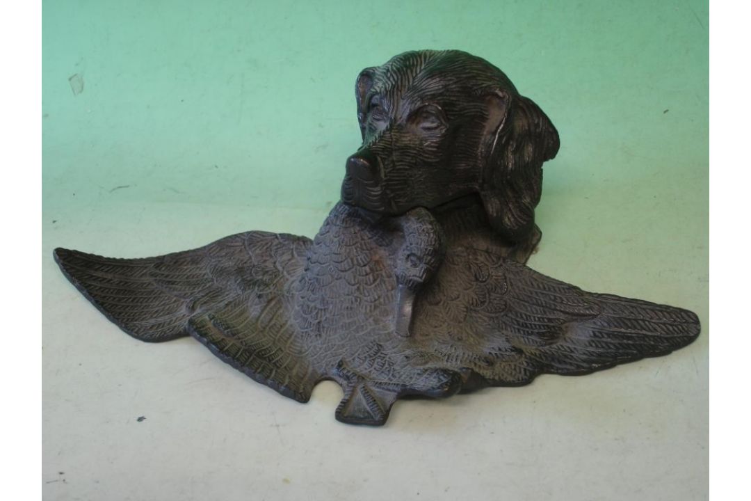 A Bronze Inkstand Realistically modelled as a retriever with duck. Early 20th century. 11 ¼" wide