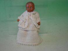 A Baby Doll Composition with jointed limbs, 5 ½
