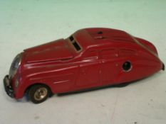 A Schuco Kommando Anno 2000 Car Voice activated. Maroon paint. 5 ½