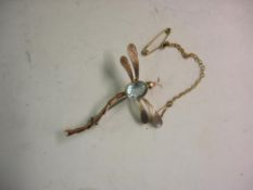 A Gold Dragonfly Brooch Yellow and rose gold set with aquamarine