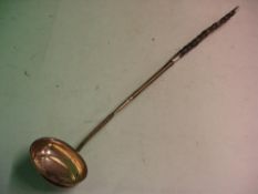 A George 111 Silver Punch Ladle with bright cut decoration and twisted whalebone handle. 15 ½