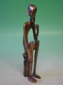 An African Cast Brass Male Figure Of stylised form. 9