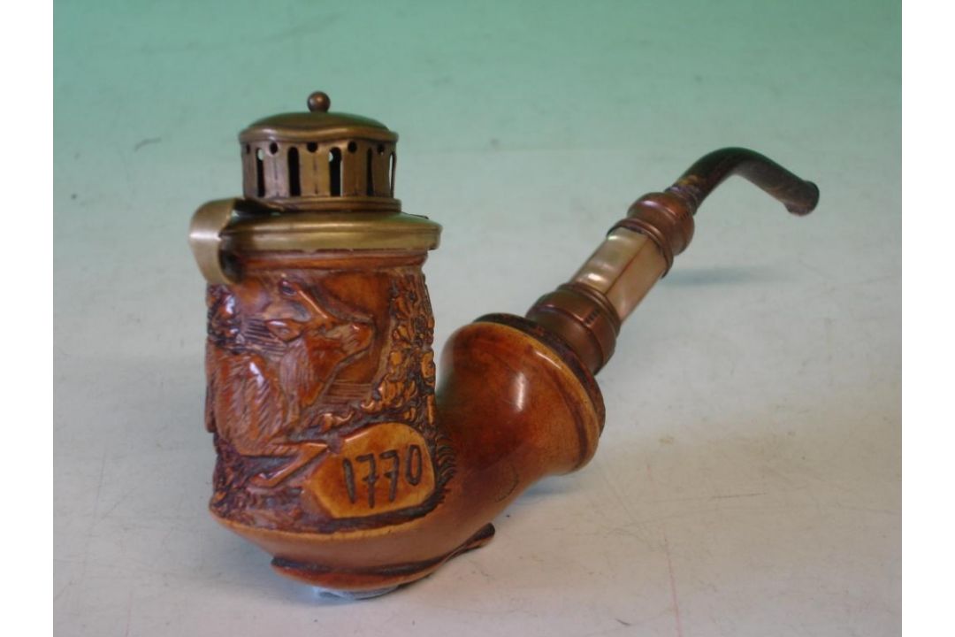 A Viennese Tobacco Pipe Carved with a stag. The bowl 2 ½" high