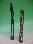 African Art Two figural wood carvings, the taller 19