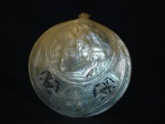An Abalone Shell Carved in relief with a scene of the Ascension and pierced with foliage. 5