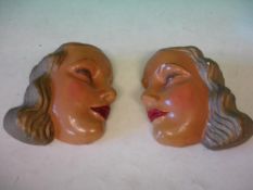 A Pair of Plaster Wall Plaques Modelled and painted as female heads in profile. c1930s. 8