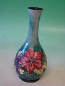 Moorcroft Pottery A Hibiscus baluster vase. Bears paper label. 10 ¼