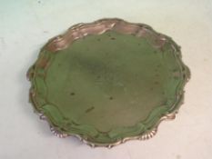 A George 11 Silver Waiter The scrolled border interspersed with shells, an engraved stag motif to