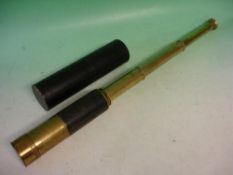 A Three Draw Telescope Gilt brass and leather tube with glare shield and lens cap. Cased. No maker's