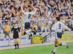 Signed Paul Gascoigne football print depicting Paul Gascoigne after scoring a 35 yard free kick