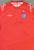Signed England shirt autographed by Ledley King and Jermaine Defoe in G condition