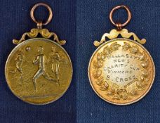 Gold medal awarded to Benny Cross for winners of the Wallasey News Charity Cup, circa 1913