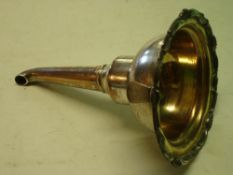 A Sheffield Plate Wine Funnel. The scrolled rim interspersed with shells, gilded bowl. 6