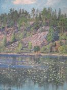 Hjalmar Trafvenfeldt 1851-1937. Lake scene with woodland. Signed and dated 1925. Oil on canvas 25