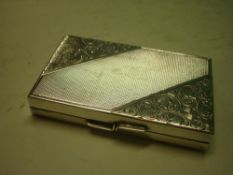 A Silver (835) Card Case, Engine turned and chased with foliage. 3