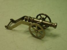 A Silversmith's Model of a Cannon. White metal. 3