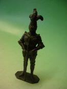 A Britannia Metal Table Cigar Lighter in the form of a knight in armour. 8