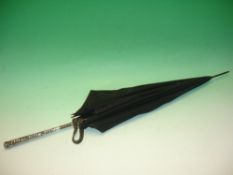 A Fox Paragon Parasol with embossed Asian silver handle c1900