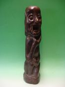 Ethnic Art. A hardwood figural carving. 24