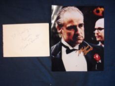 Marlon Brando. A colour photograph of Brando as he appeared in The Godfather, signed boldly in