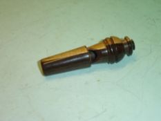 A Lignum Vitae Whistle with screw threaded top. 3