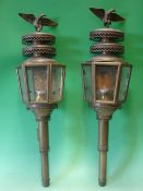 A Pair of Brass Carriage Lamps each with an eagle surmount. 27