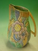 Beswick. An Art Deco Jug no. W611, the relief decoration of flowers painted in muted tones. 10 ¾