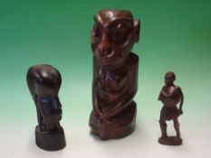 African Art. Three treen carvings, the largest 12
